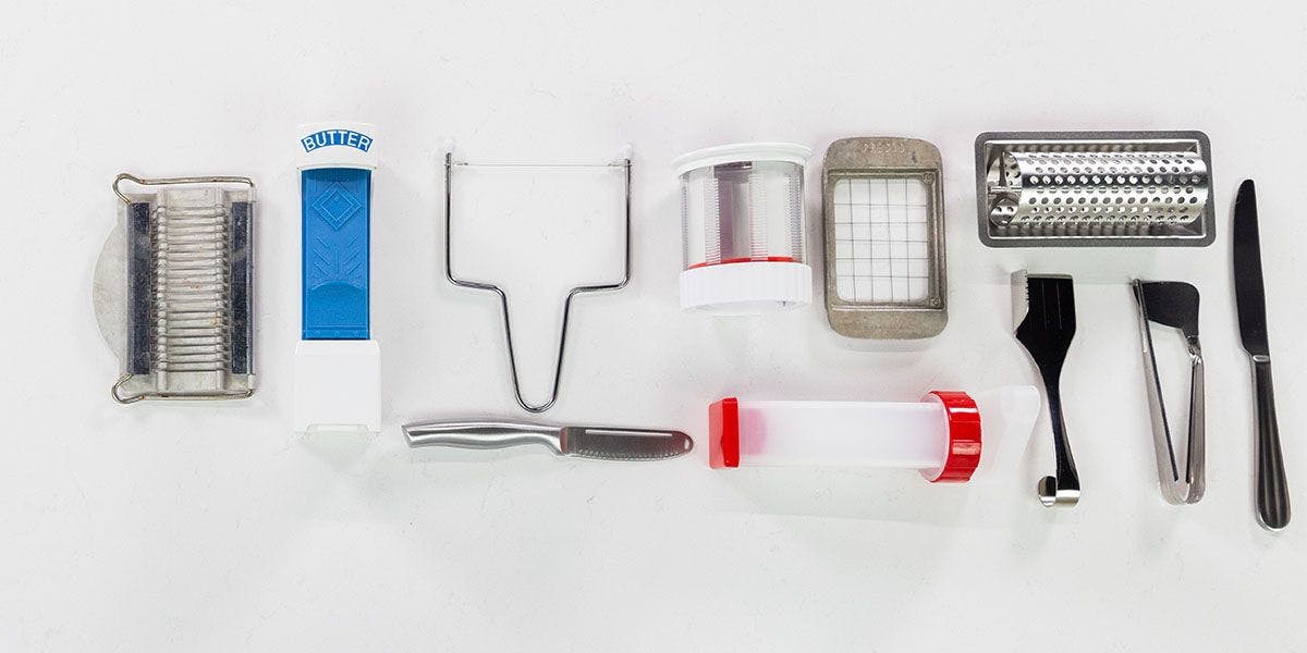 Butter gadgets lined up on a counter.