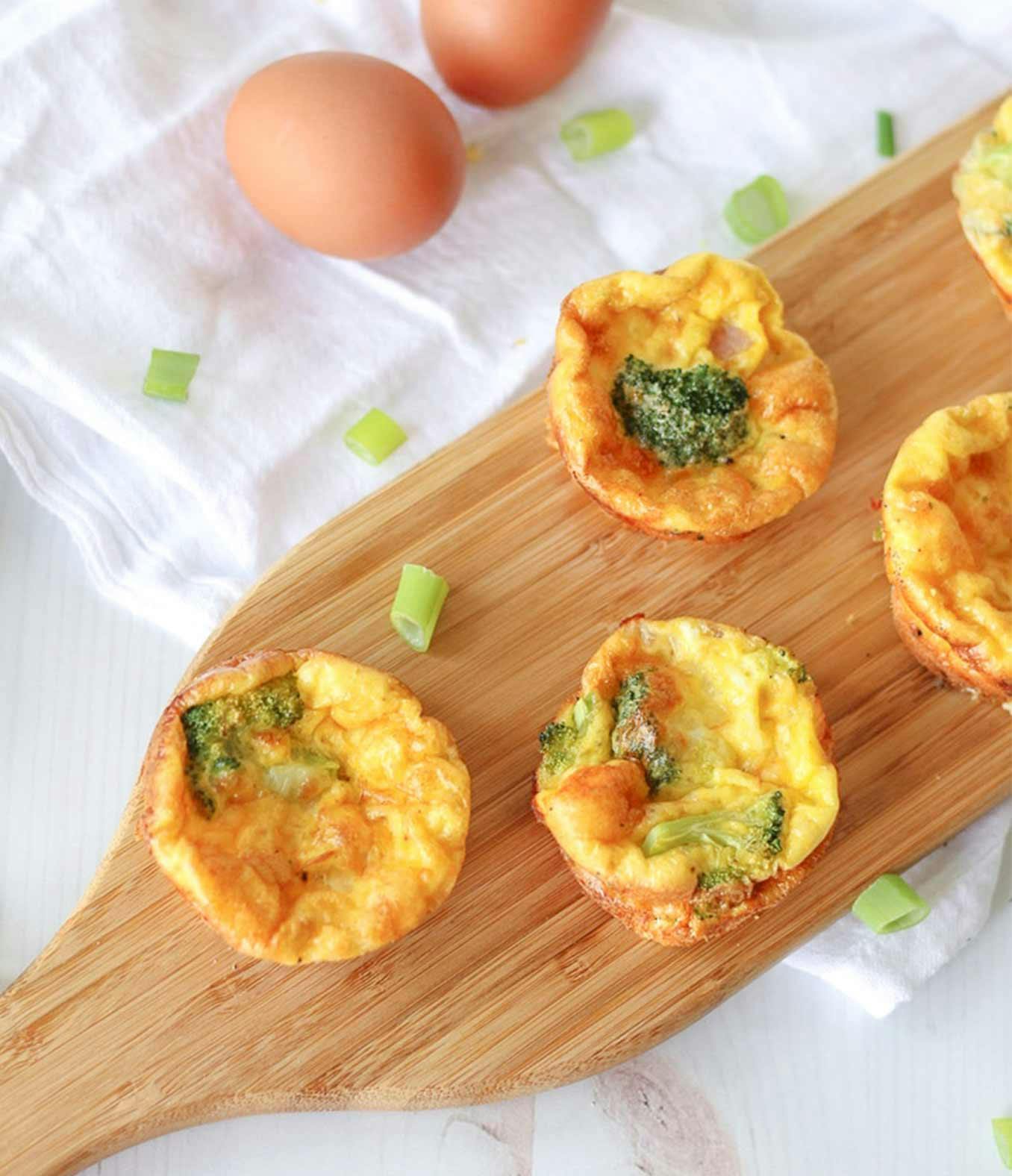 5 Ingredient Mini Crustless Quiche on a wood serving platter.