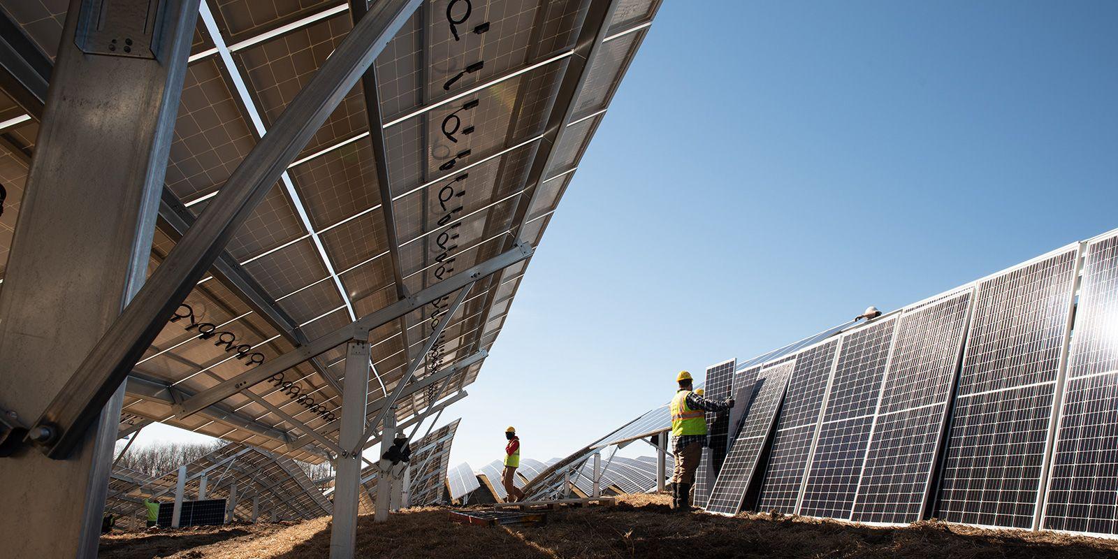 Solar panels being installed for a community solar project.