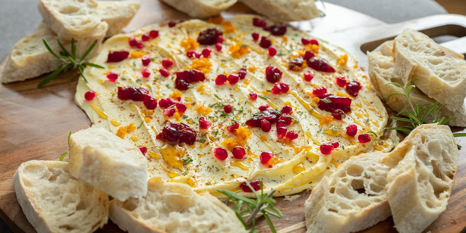 A holiday butter board with bread.