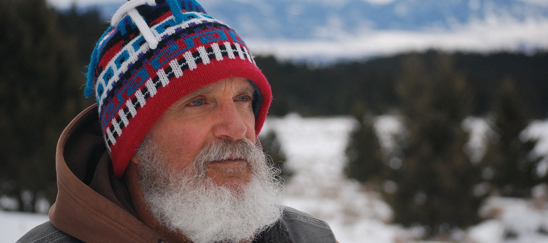 Fred Provenza with a mountain landscape background