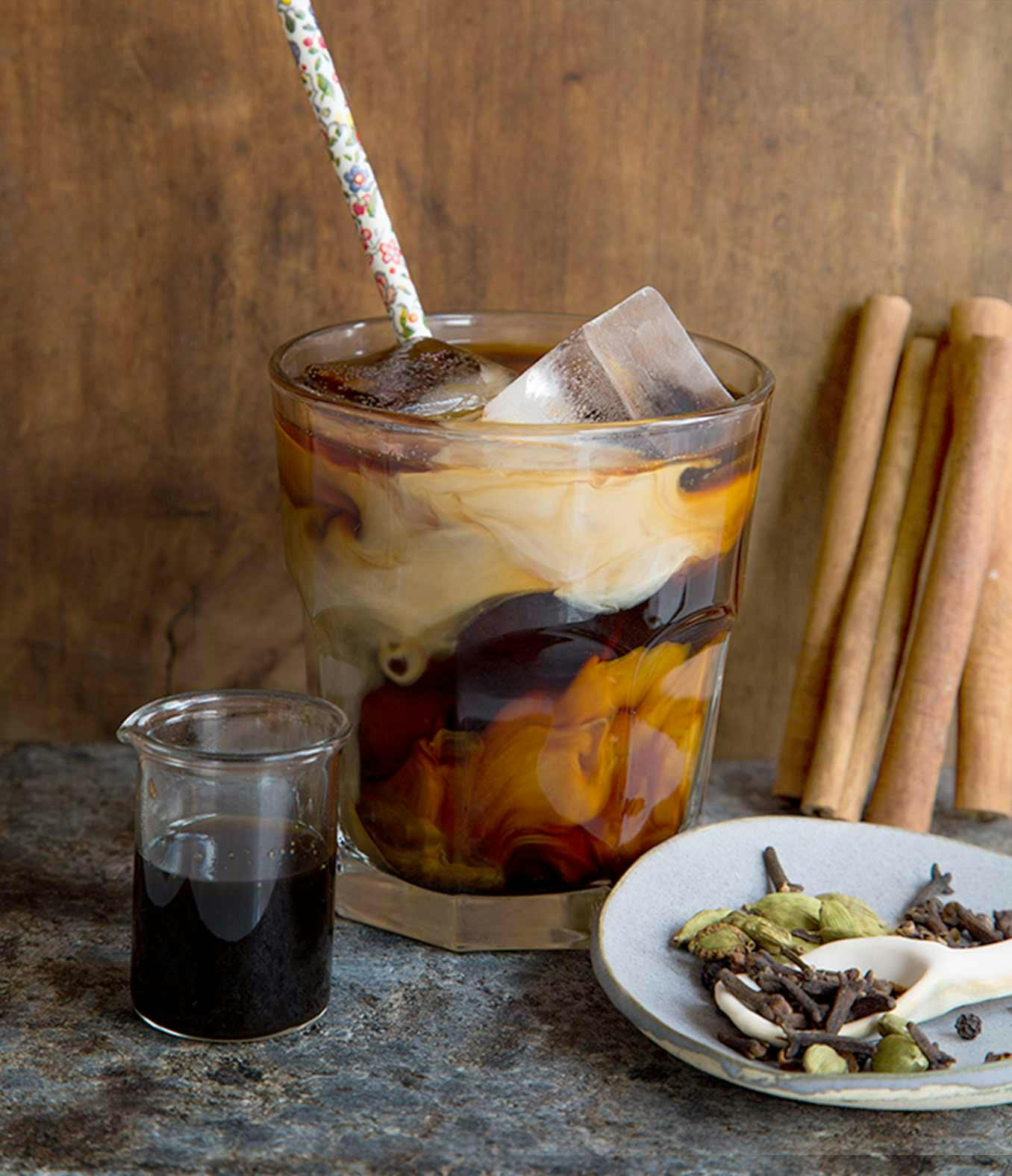 Vietnamese iced coffee with a straw.