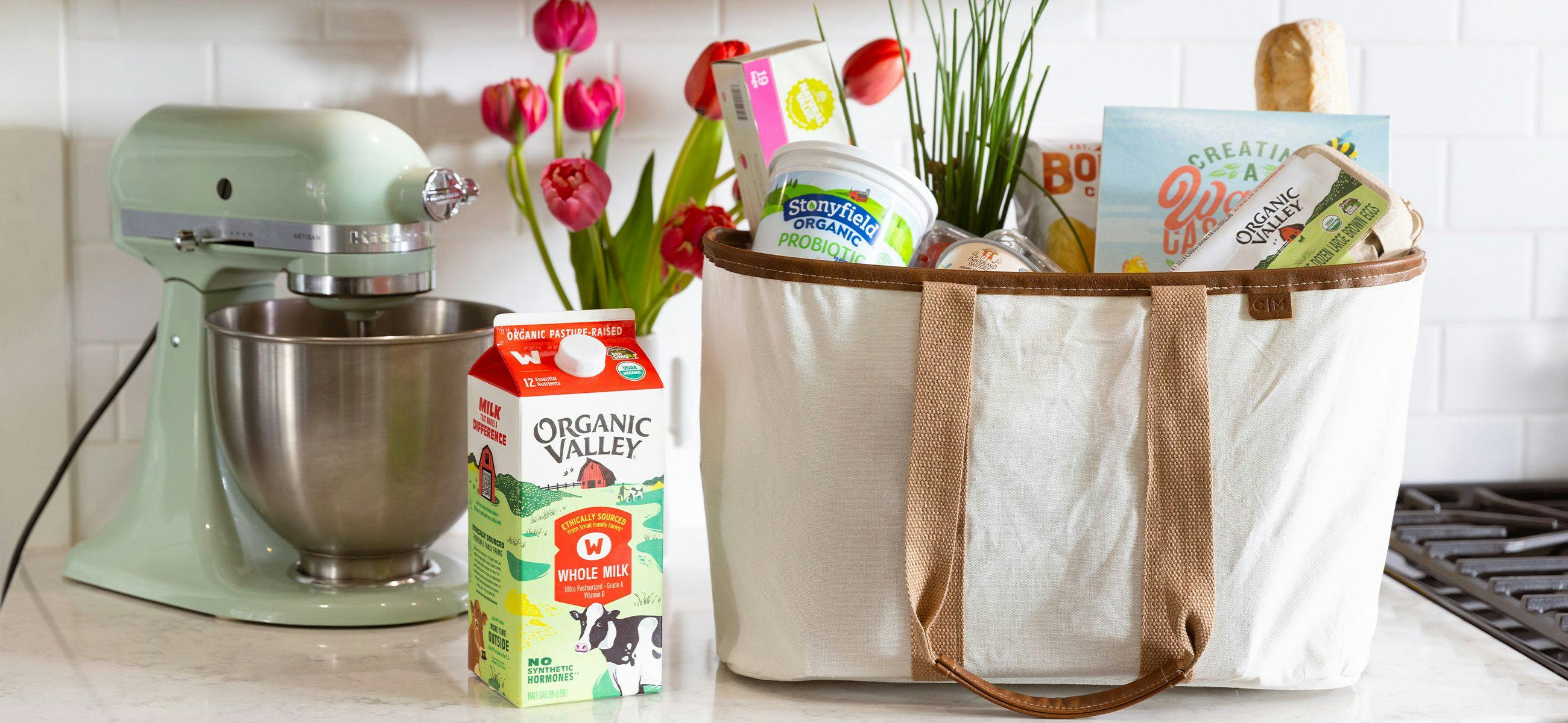 Organic Valley Milk next to a reusable grocery tote and mixer