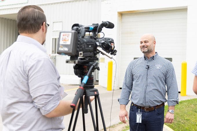 CEO Jeff Frank in front of a camera.