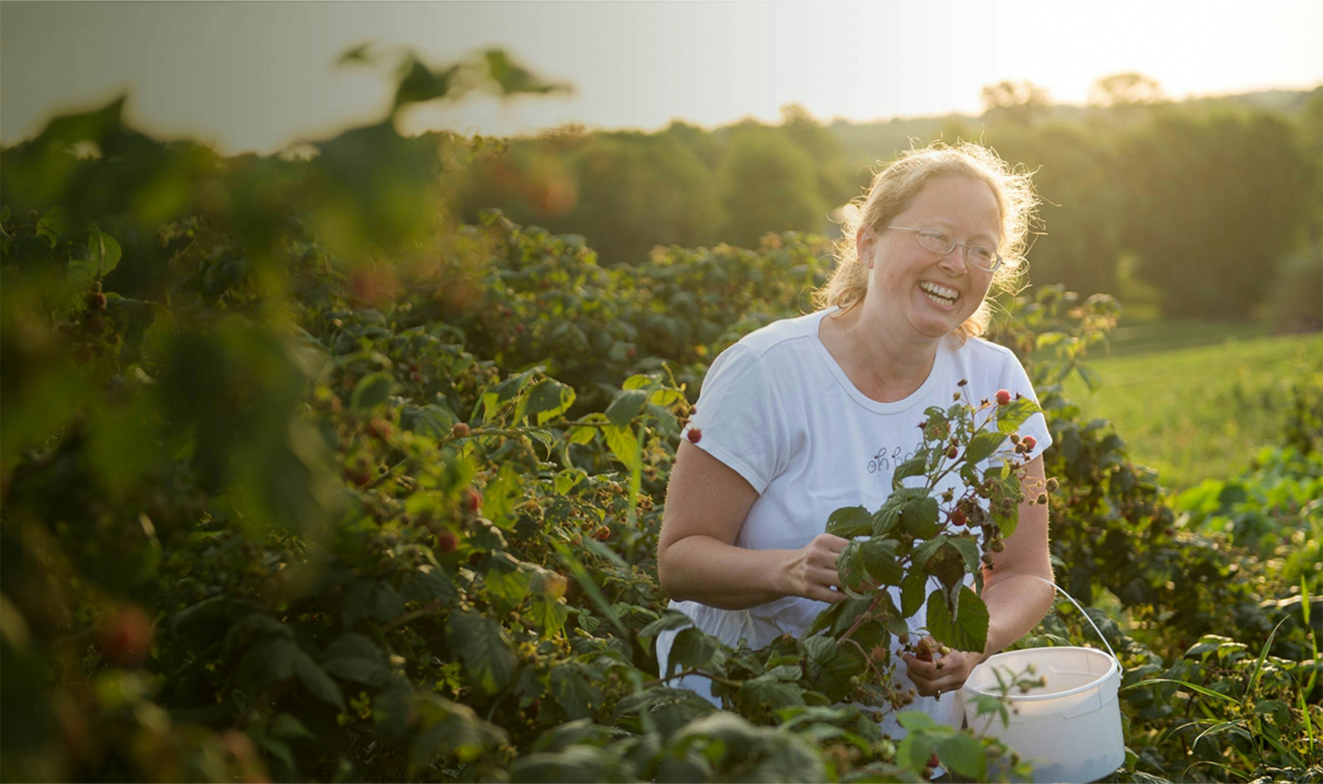 An Organic Valley farmer in her garden